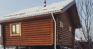 Баня из оцилиндрованного бревна под ключ в Сосновом Бору - от 135668 рублей